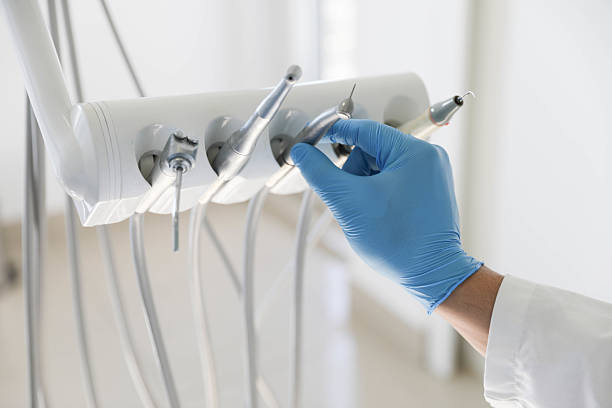 Professional Tooth Extraction technician working in Iola, WI